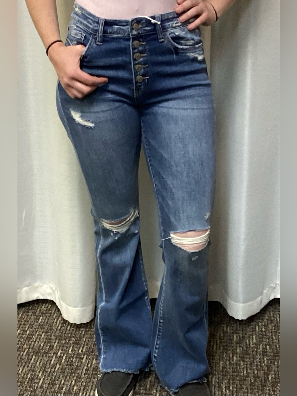 High-Rise Distressed Flared Jeans in Medium Blue